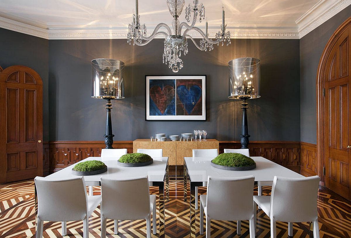 Đồ nội thất và phông nền màu xám đậm tạo thêm phong cách tối giản cho phòng ăn hiện đại rộng rãi này