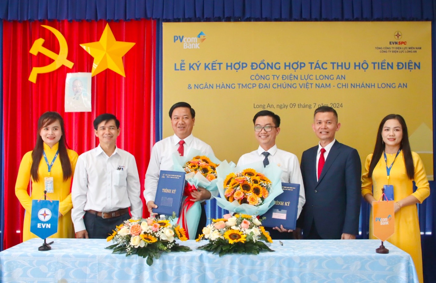 PVcomBank và Công ty Điện lực Long An ký kết hợp đồng thu hộ tiền điện- Ảnh 1.