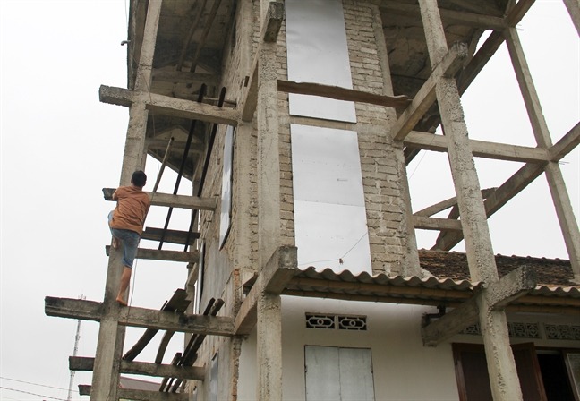 Nghệ An có một ngôi nhà 9 tầng kỳ quái: Cách xây dựng khác người, tưởng nguy hiểm mà vẫn đứng vững gần 20 năm- Ảnh 2.