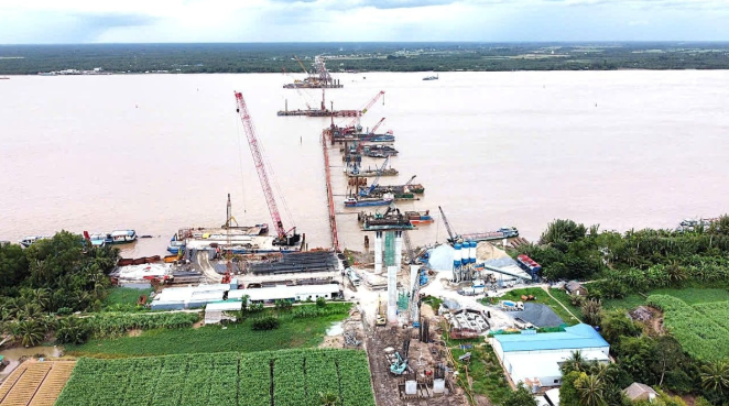 Cầu vượt sông 8.000 tỷ xoá bỏ toàn bộ các bến phà lâu đời, rút ngắn khoảng 80km từ miền Tây đến TP. HCM: Nỗ lực vượt khó hoàn thành đúng kế hoạch- Ảnh 1. Cầu vượt sông 8.000 tỷ xoá bỏ toàn bộ các bến phà lâu đời, rút ngắn khoảng 80km từ miền Tây đến TP. HCM: Nỗ lực vượt khó hoàn thành đúng kế hoạch- Ảnh 1.