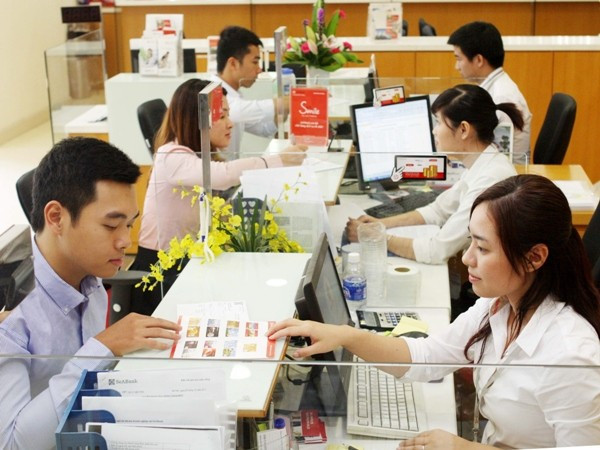 "Tình trạng sở hữu chéo trong hệ thống ngân hàng từng bước được xử lý"- Ảnh 2. "Tình trạng sở hữu chéo trong hệ thống ngân hàng từng bước được xử lý"- Ảnh 2.