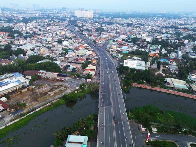 Tỉnh giàu nhất Việt Nam sáp nhập vào TP. HCM chi 21.000 tỷ mở rộng, xây đường trên cao cho tuyến quốc lộ nối thẳng biên giới- Ảnh 1.