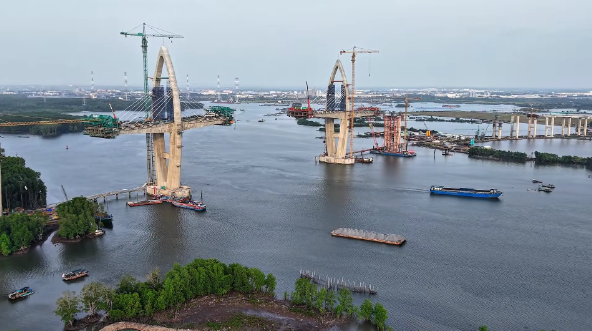 Cây cầu có nhịp chính dài nhất Đông Nam Á, kết nối 2 tỉnh thành giàu nhất cả nước sẽ hợp long trong năm nay- Ảnh 1. Cây cầu có nhịp chính dài nhất Đông Nam Á, kết nối 2 tỉnh thành giàu nhất cả nước sẽ hợp long trong năm nay- Ảnh 1.