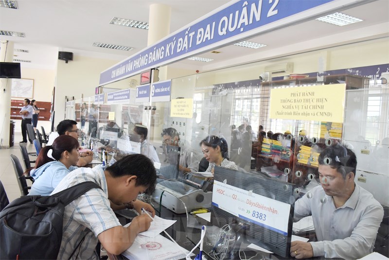 Giữ nguyên mô hình Văn phòng đăng ký đất đai, không phân cấp về xã- Ảnh 1.