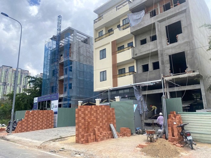 Dự kiến rút ngắn một nửa thời gian cấp phép xây dựng nhà ở- Ảnh 1.