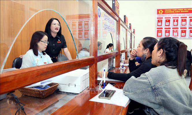 Đẩy mạnh phân cấp, phân quyền thủ tục hành chính cho chính quyền địa phương- Ảnh 1.