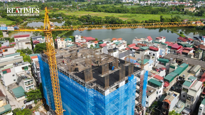 Bộ Xây dựng phổ biến Luật Xây dựng mới: Bỏ chứng chỉ năng lực doanh nghiệp, rút ngắn cấp phép còn 7 ngày - Ảnh 2.