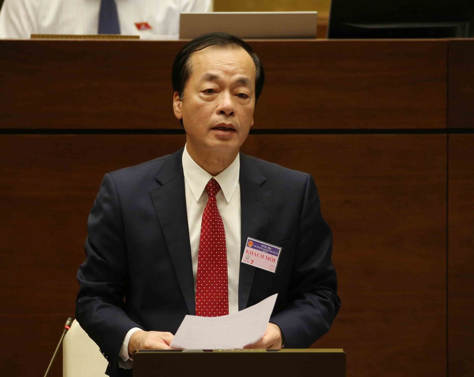 Minister of Construction Pham Hong Ha fields lawmakers' questions on June 4. (Photo: VNA)