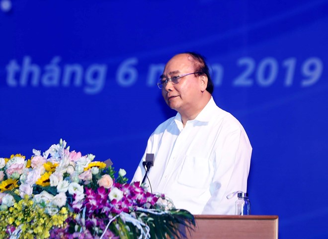 Prime Minister Nguyen Xuan Phuc speaks at the conference. (Photo: VNA)