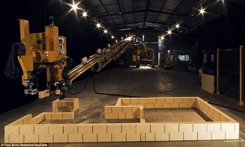 A robot is builing brick wall