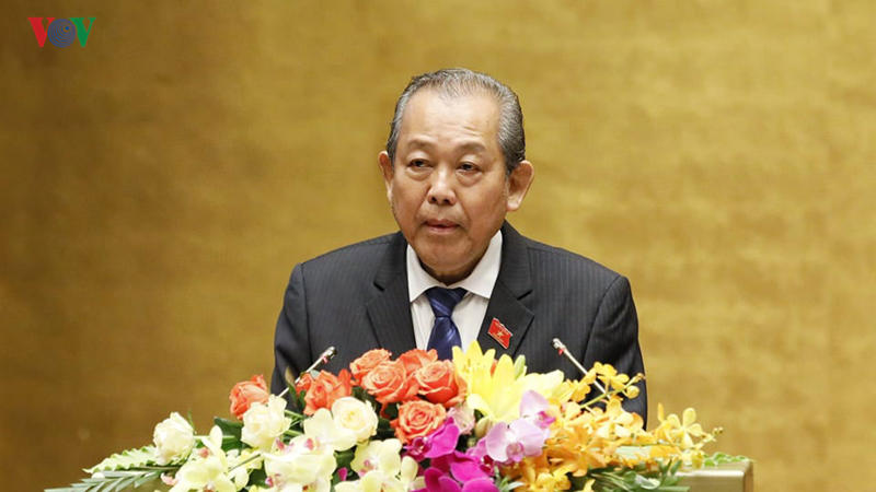 Phó Thủ tướng Thường trực Chính phủ Trương Hòa Bình báo cáo trước Quốc hội.