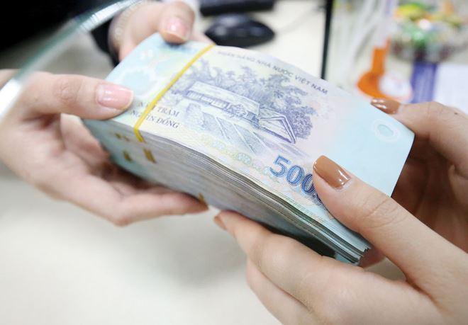 Ngân hàng vẫn là nguồn cung cấp vốn chính cho thị trường bất động sản Việt Nam. Ảnh: Dũng Minh