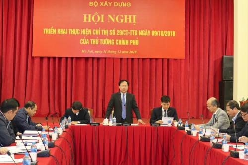 Thứ trưởng Bộ Xây dựng Nguyễn Văn Sinh phát biểu tại Hội nghị. Ảnh: Thu Hằng/BNEWS/TTXVN