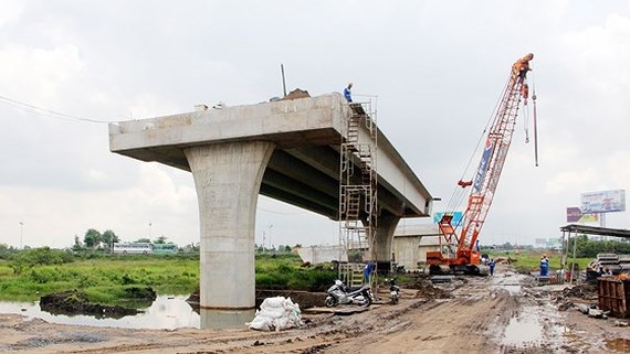 Điểm đầu của cao tốc Trung Lương - Mỹ Thuận tại nút giao thông Thân Cửu Nghĩa (Tiền Giang). Ảnh: TUẤN QUANG