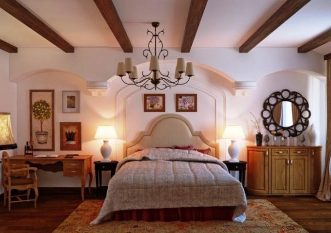Điển nhấn cổ điển trong mẫu nội thất hiện đại này là chiếc đầu giường, chiếc đèn chùm và bộ bàn ghế có hình dáng cũ kĩ