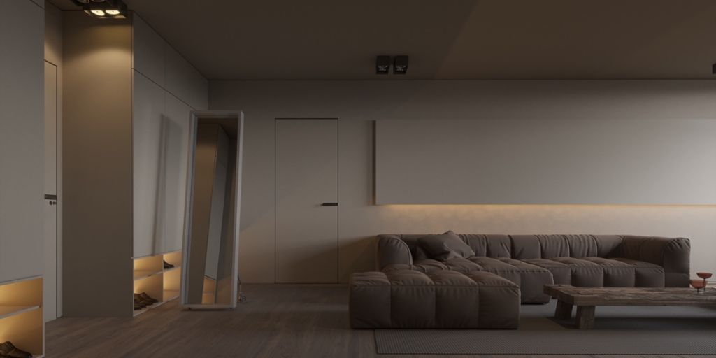 Bắt đầu với phòng khách, không gian rộng được tạo thành từ một bộ sofa mềm, kiểu dáng đơn giản có màu xám, nổi bật trên nền tường màu mộc.