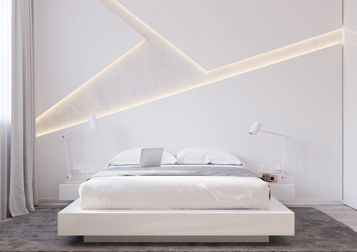 Khi quyết định sử dụng màu trắng cho phòng ngủ, bạn phải thật thông minh và khéo léo trong việc đưa ánh sáng vào căn phòng này. Chiếc đèn hình học này làm tăng thêm sự chú ý cho căn phòng tưởng chừng đơn điệu.