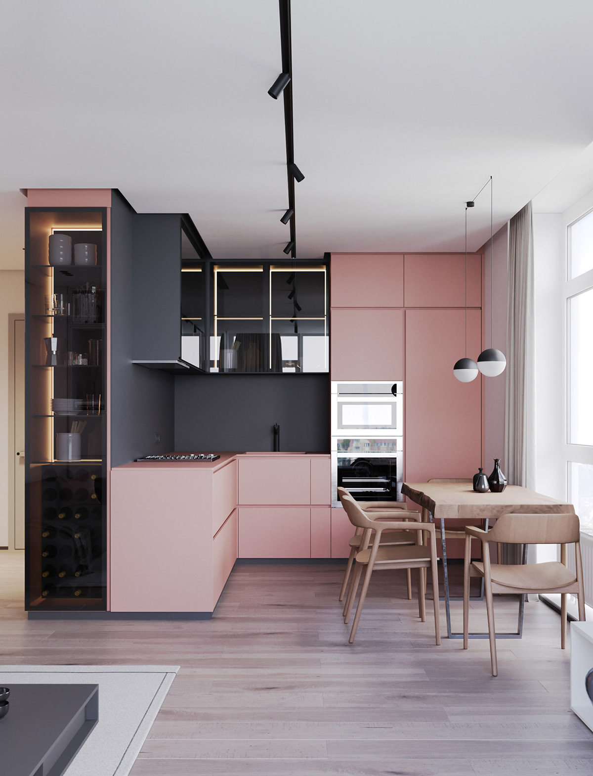 Nhắc đến một căn bếp màu hồng, nhiều người sẽ nghĩ đến sự dịu dàng của tông màu pastel. Nhưng khi kết hợp màu hồng với tủ bếp màu đen hoặc xám, cùng chiếc bàn ăn bằng gỗ thô, tất cả đều có tông màu lì sẽ làm thay đổi định nghĩa của nhiều người về sự dịu dàng.