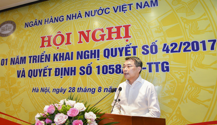 Ông Lê Minh Hưng, Thống đốc NHNN yêu cầu các tổ chức tín dụng đẩy nhanh tái cơ cấu và xử lý nợ xấu. Ảnh: Kiều Khanh