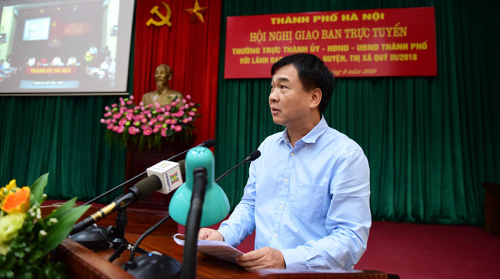 Giám đốc Sở Xây dựng Hà Nội Lê Văn Dục Báo cáo tại Hội nghị.