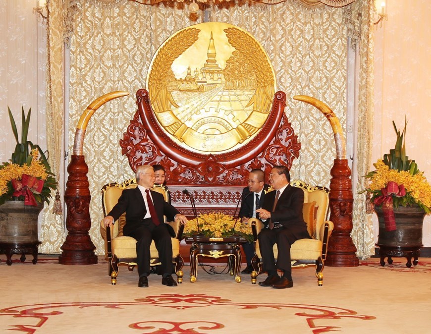 Tổng Bí thư, Chủ tịch nước Nguyễn Phú Trọng gặp đồng chí Choummaly Sayasone, nguyên Tổng Bí thư, Chủ tịch nước Lào. (Ảnh: Trí Dũng/TTXVN)
