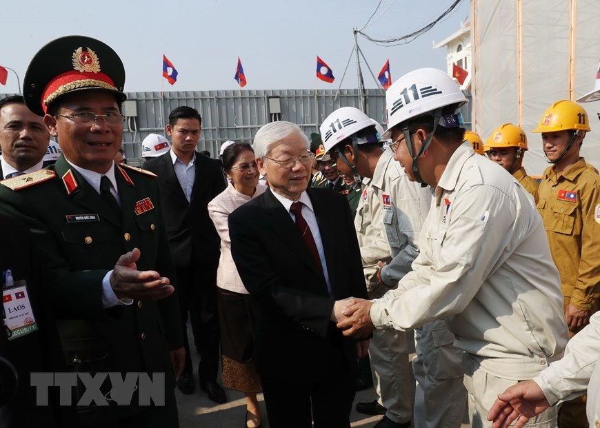 Tổng Bí thư, Chủ tịch nước Nguyễn Phú Trọng đến thăm dự án xây dựng Nhà Quốc hội Lào. (Ảnh: Trí Dũng/TTXVN)