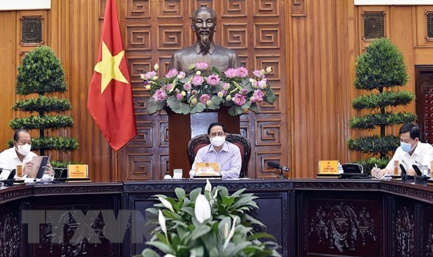 Thủ tướng Phạm Minh Chính chủ trì cuộc họp. (Ảnh: TTXVN)