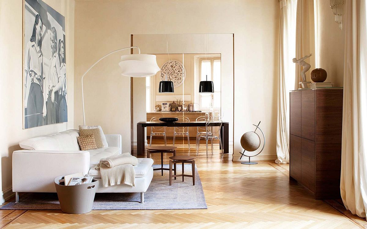 Họa tiết chevron sàn gỗ tạo thêm nét đặc trưng cho phòng khách với gam màu trắng