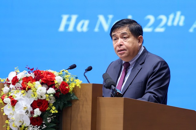 Bộ trưởng Bộ KH&ĐT Nguyễn Chí Dũng báo cáo tại Hội nghị - Ảnh: VGP/Nhật Bắc