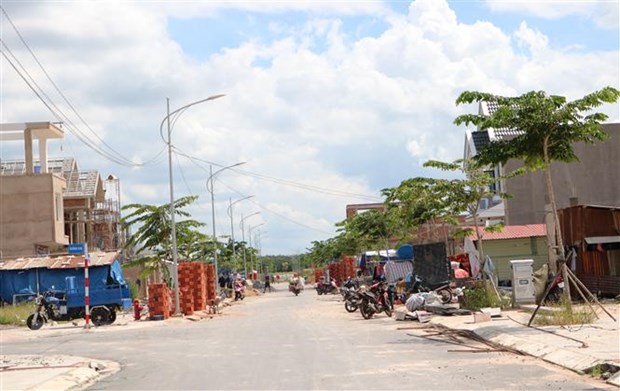 Nhiều ngôi nhà mọc lên tại Khu tái định cư Lộc An-Bình Sơn. (Ảnh: Công Phong/TTXVN)
