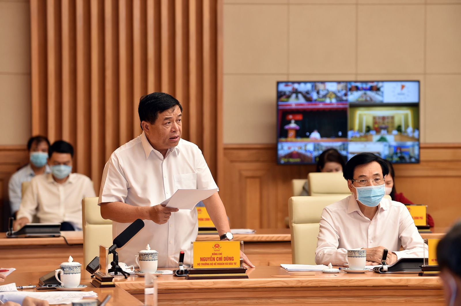 Bộ trưởng Bộ KH&ĐT Nguyễn Chí Dũng báo cáo tại Hội nghị