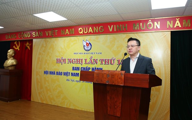 Nhà báo Lê Quốc Minh