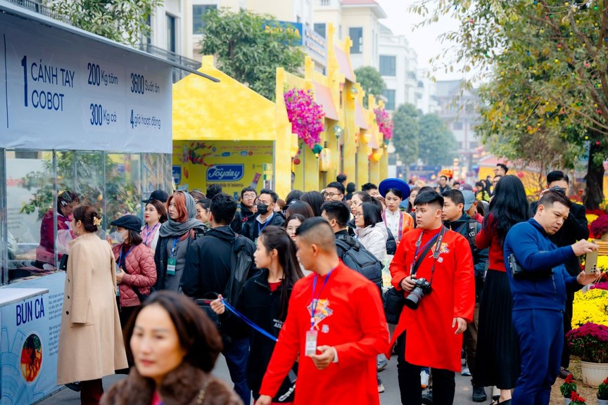 A group of people walking on a street  AI-generated content may be incorrect.