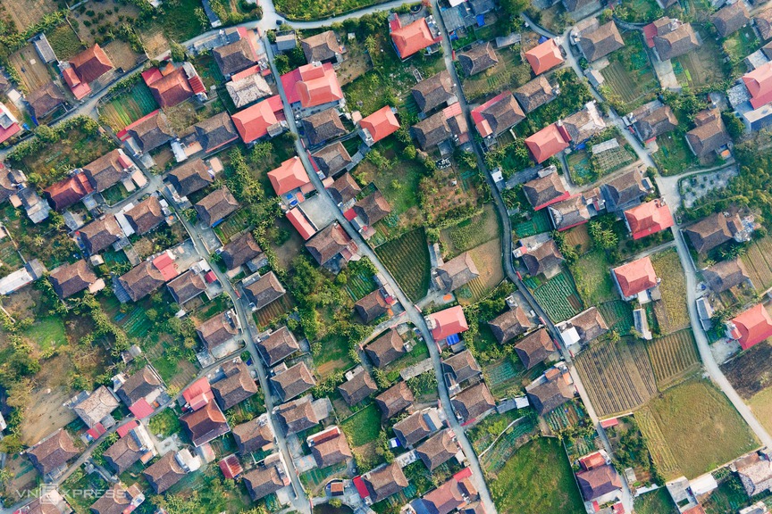 Ngôi làng trong 'thung lũng vàng' Việt Nam được thế giới lựa chọn: 450 ngôi nhà cổ giống hệt nhau cùng quay về một hướng- Ảnh 2. Ngôi làng trong 'thung lũng vàng' Việt Nam được thế giới lựa chọn: 450 ngôi nhà cổ giống hệt nhau cùng quay về một hướng- Ảnh 2.