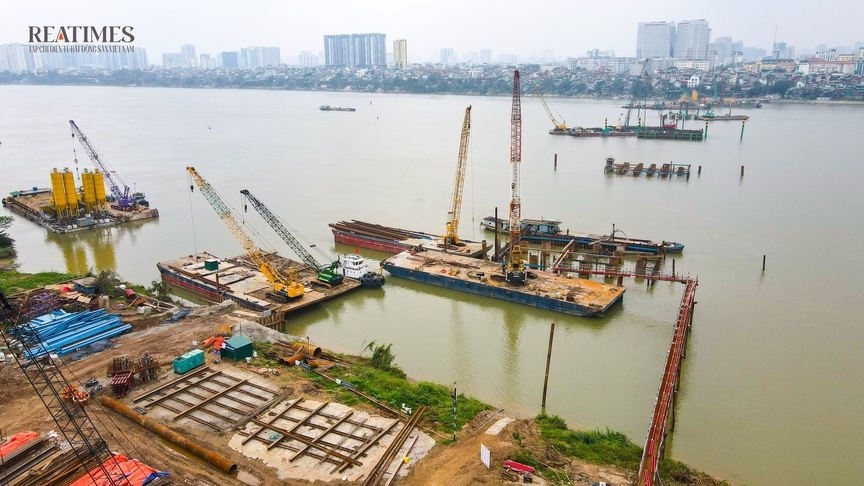 Hối hả thi công xuyên Tết tại dự án cầu Trần Hưng Đạo- Ảnh 2. Hối hả thi công xuyên Tết tại dự án cầu Trần Hưng Đạo- Ảnh 2.