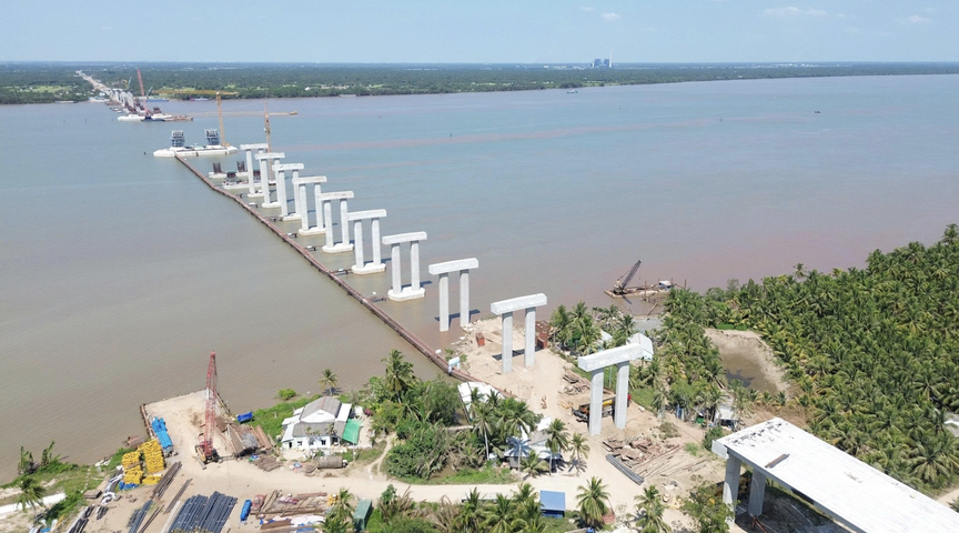 Cầu vượt sông 8.000 tỷ xoá bỏ toàn bộ các bến phà lâu đời, rút ngắn khoảng 80km từ miền Tây đến TP. HCM: Đã hoàn thành 70%, 2 năm nữa thông xe- Ảnh 1.