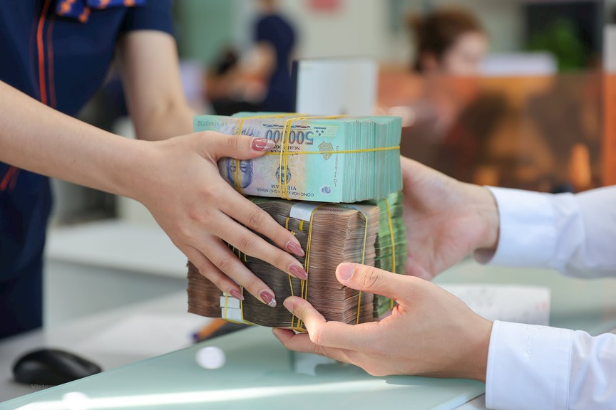 TS. Huỳnh Thanh Điền: Nới tỷ lệ vốn ngắn hạn cho vay dài hạn là bước đi cần thiết để khơi thông dòng vốn cho nền kinh tế - Ảnh 1.